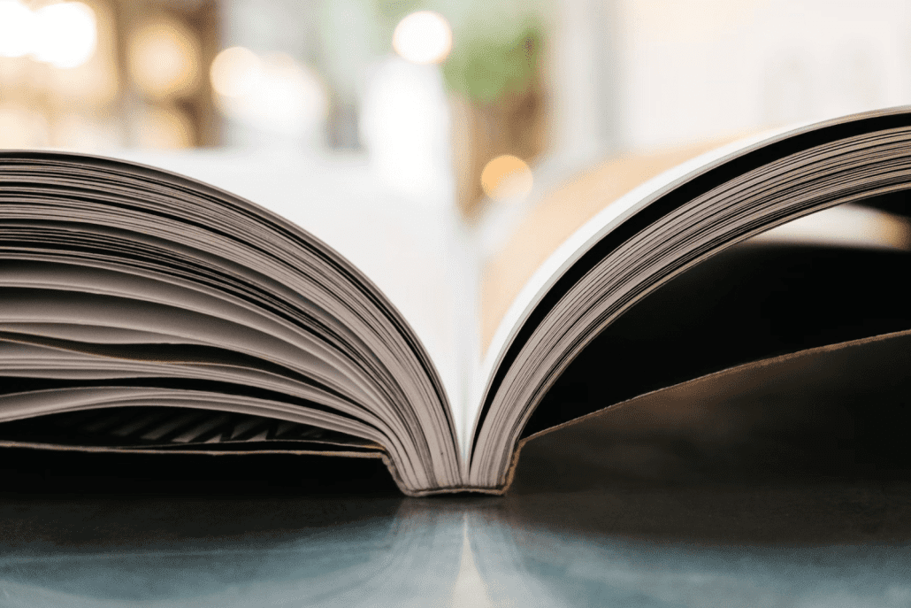 an open book sitting on top of a table.