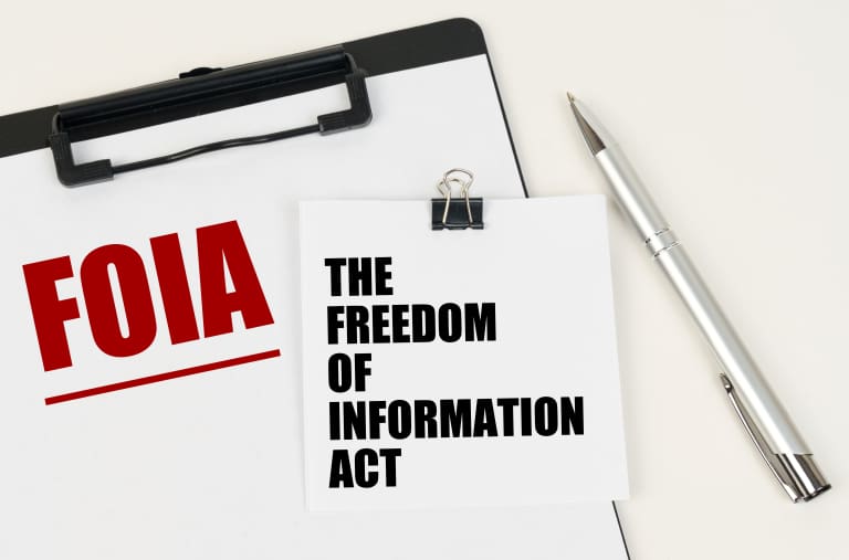 A clipboard with the words foia the freedom of information act.