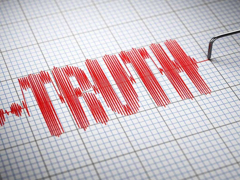 The word truth is written on a piece of paper.