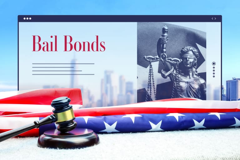 A gavel sits on top of an american flag and the word bail bonds.