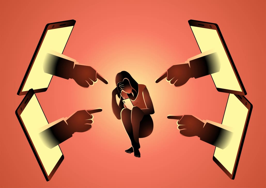 A woman is pointing her finger at a group of people.