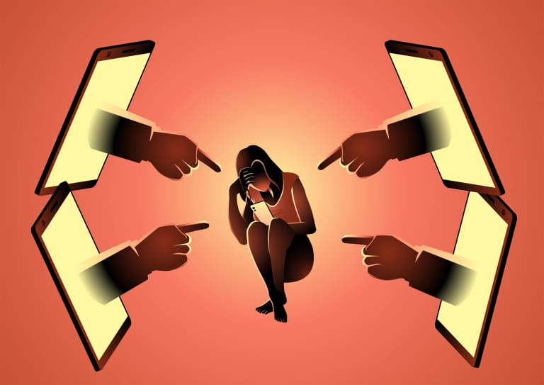 A woman is pointing her finger at a group of people.