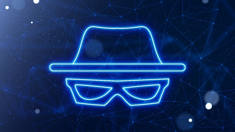 A neon hat and sunglasses icon on a dark background.
