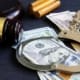 Bail bond. Corruption. Gavel, handcuffs and money.